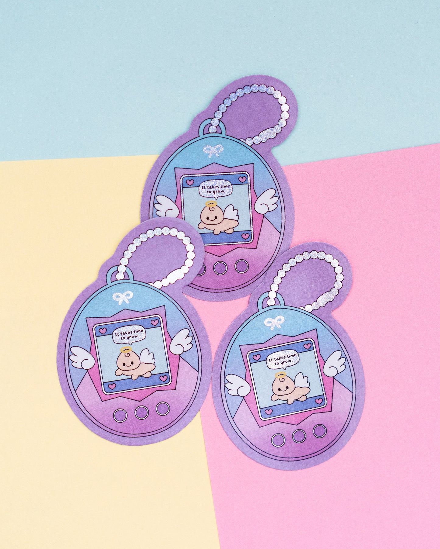 It Takes Time To Grow Tamagotchi Holographic Finish Die-Cut Sticker