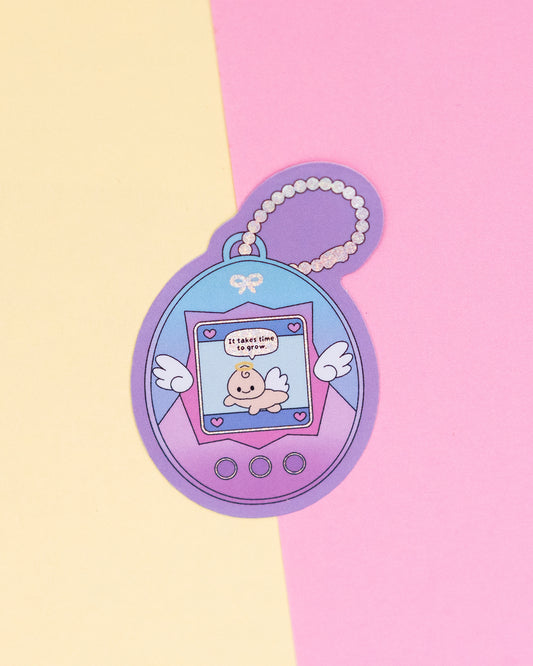It Takes Time To Grow Tamagotchi Holographic Finish Die-Cut Sticker